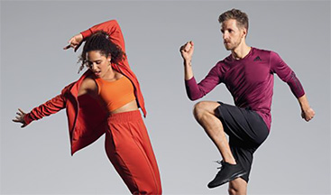 EGYM-Wellpass - eine Frau und ein Mann in Trainingskleidung beim Sport